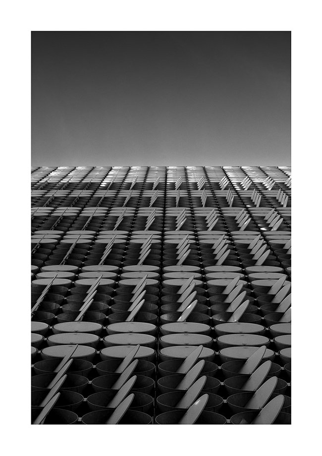 Photo of house facade with blinds in circle shape that are folded out